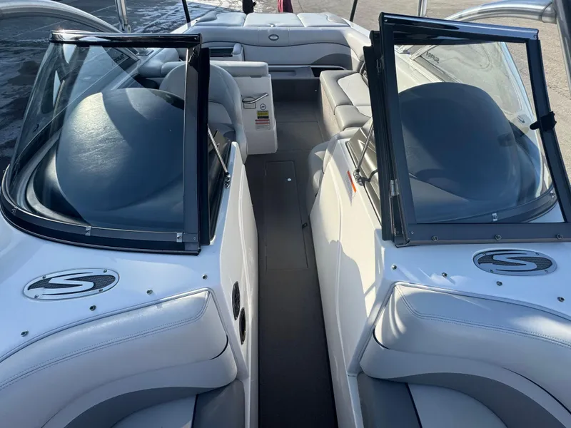 Slide: The Image of 2007 Supra 22SSV boat interior with dual windshields and seating. - 5