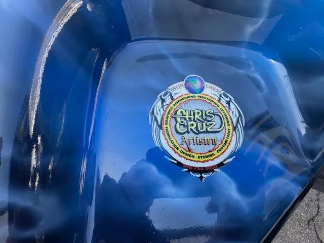 Slide: The Image of Blue Storm Boats 22, 2006 model, featuring custom Chris Cruz design logo. - 4