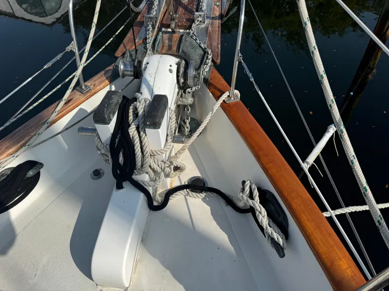 Slide: The Image of Deck of 1989 Hans Christian 43T sailboat with ropes and winch. - 19