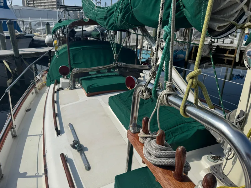 Slide: The Image of Sailboat deck of 1989 Hans Christian 43T with green covers and rigging. - 23