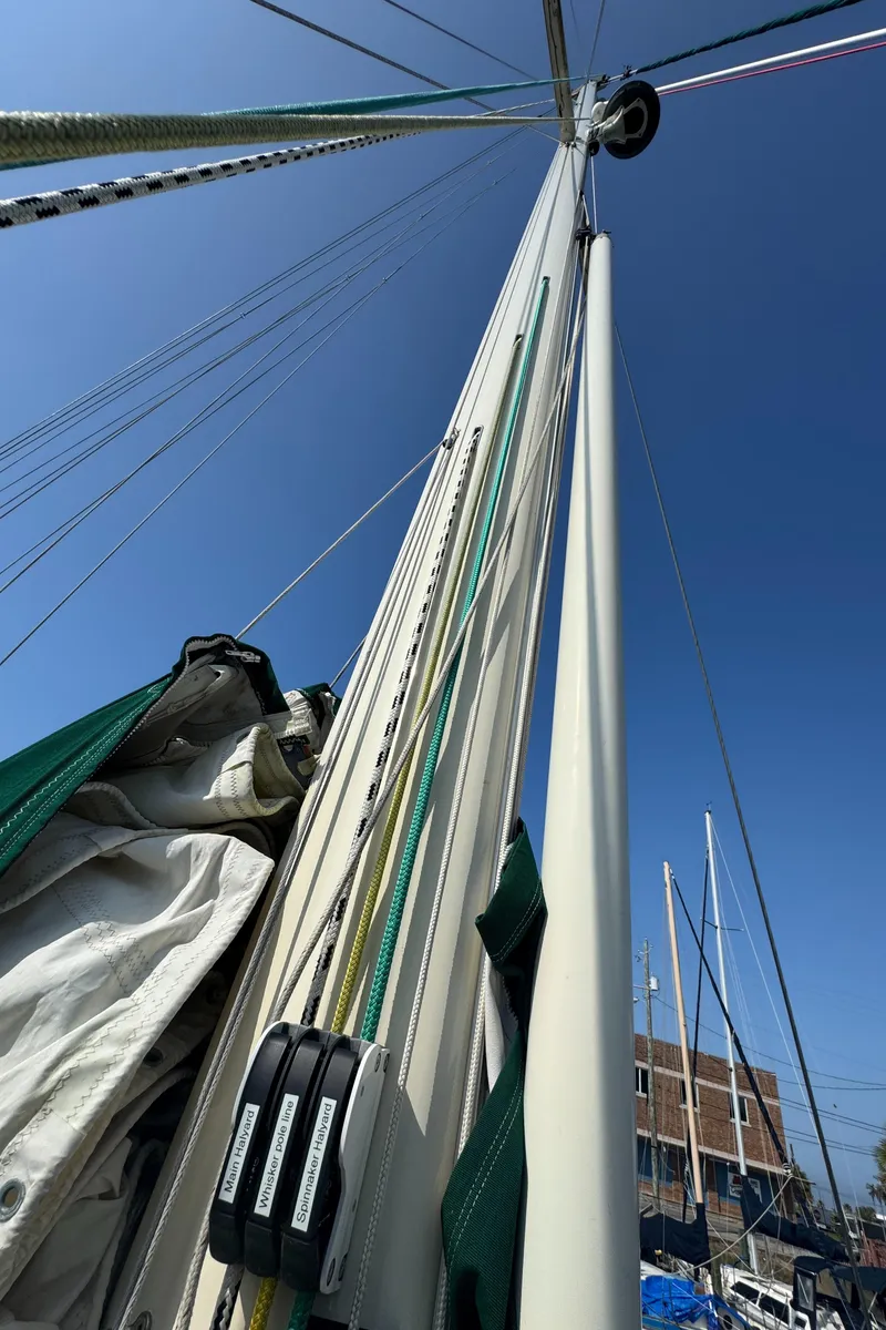 Slide: The Image of Mast and rigging of 1989 Hans Christian 43T sailboat against clear blue sky. - 26