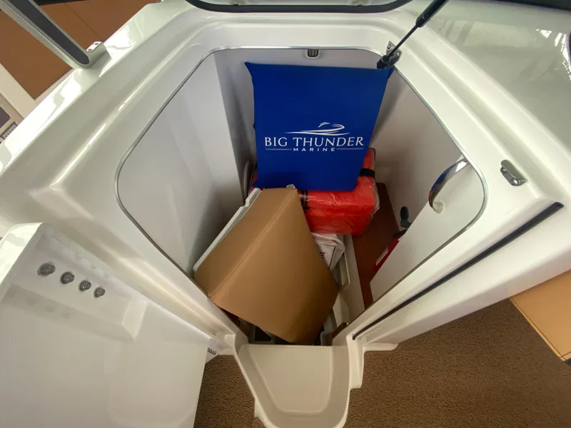 Slide: The Image of 2020 MasterCraft X26 storage compartment with Big Thunder Marine gear and equipment. - 30