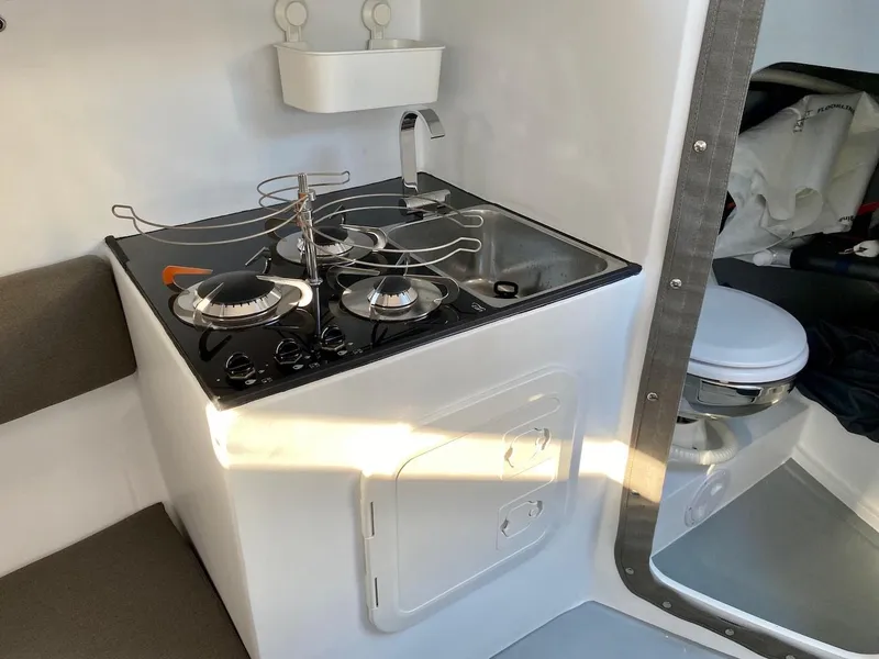 Slide: The Image of Compact yacht kitchen with stove and sink, Black Pepper Code 0.1, 2025 model. - 19
