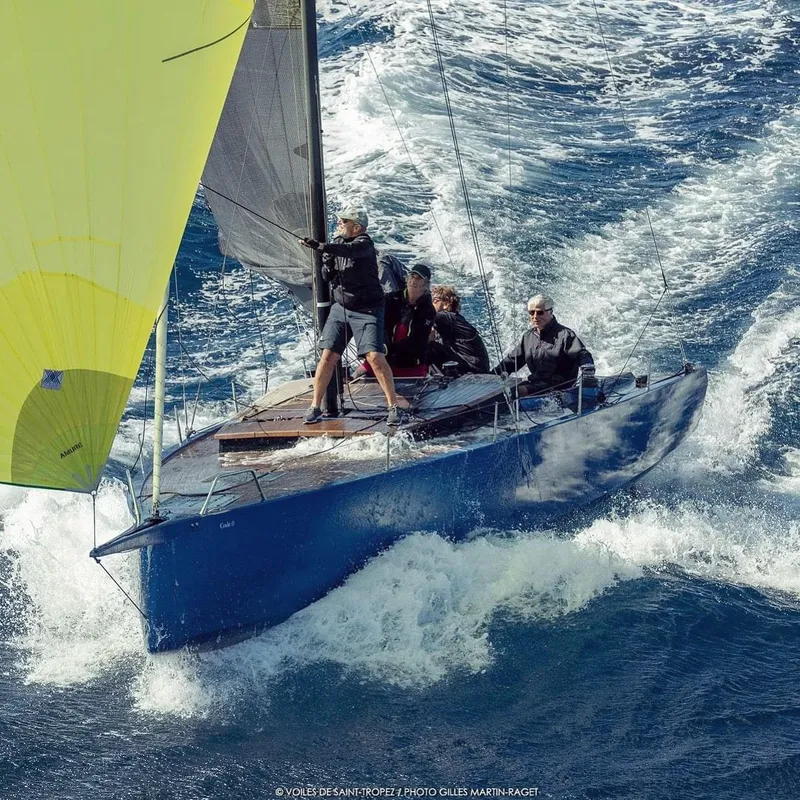 Slide: The Image of Sailing yacht Black Pepper Code 0.1 navigating rough seas, 2025 model. - 4