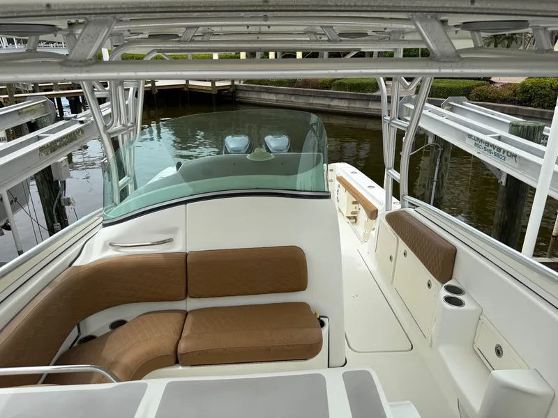 Slide: The Image of 2005 Hydra-Sports Vector 3300 VX boat interior with tan seating and sleek design. - 15