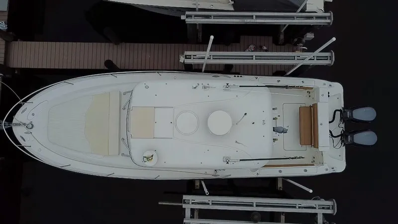Slide: The Image of Overhead view of a 2005 Hydra-Sports Vector 3300 VX boat docked. - 2