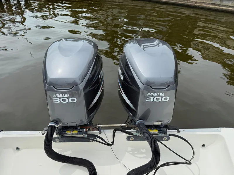 Slide: The Image of Twin Yamaha 300 outboard engines on a 2005 Hydra-Sports Vector 3300 VX boat. - 20