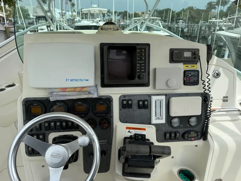 Slide: The Image of Control panel of a 2005 Hydra-Sports Vector 3300 VX boat with navigation equipment. - 28
