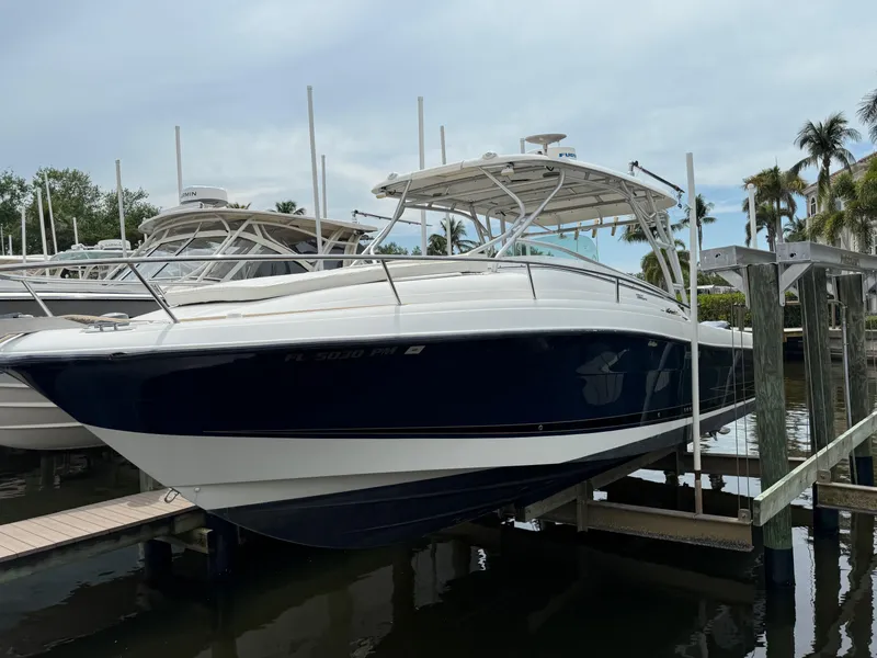 Slide: The Image of 2005 Hydra-Sports Vector 3300 VX boat docked at marina. - 40