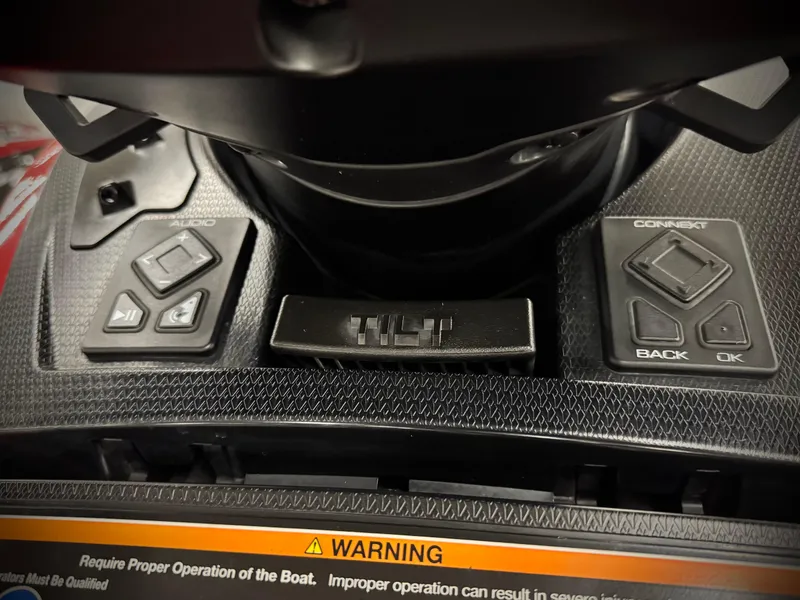 Slide: The Image of Control panel of 2022 Yamaha WaveRunner FX Cruiser SVHO with tilt and navigation buttons. - 13