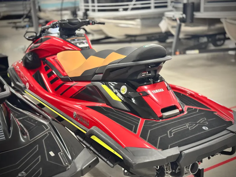 Slide: The Image of 2022 Yamaha WaveRunner FX Cruiser SVHO in vibrant red and black design. - 6