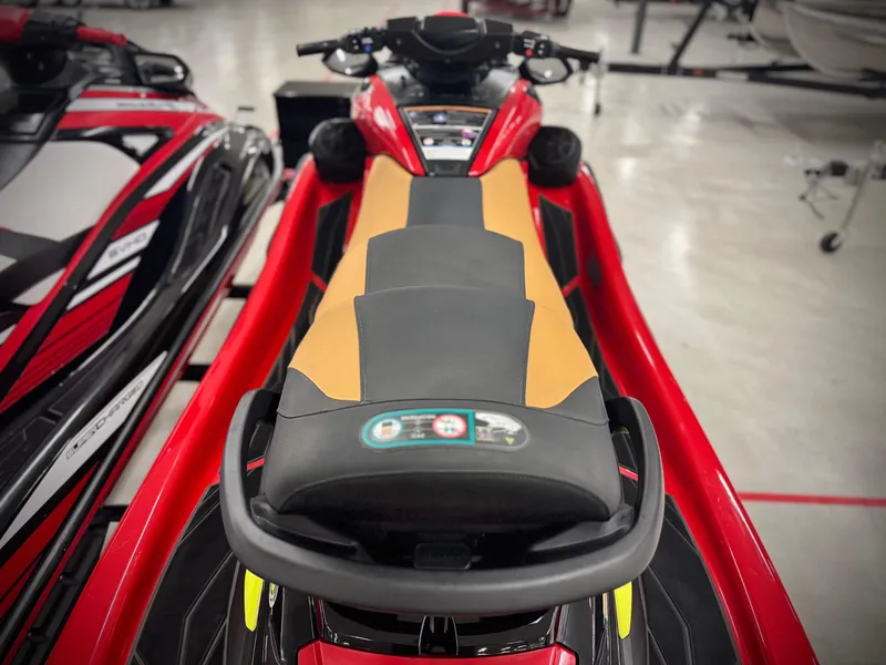 Slide: The Image of 2022 Yamaha WaveRunner FX Cruiser SVHO, red and black, in showroom display. - 9