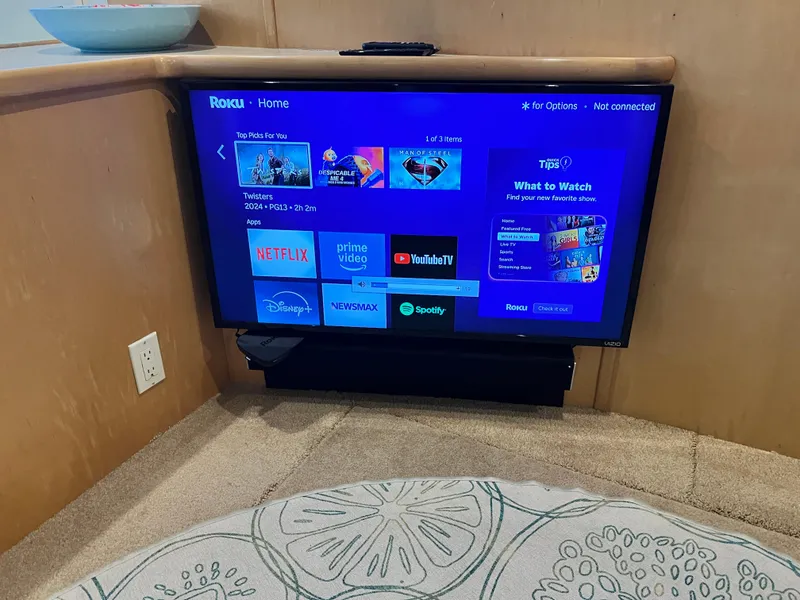 Slide: The Image of Roku home screen on a Vizio TV inside a 1998 Carver 405 Aft Cabin yacht. - 7