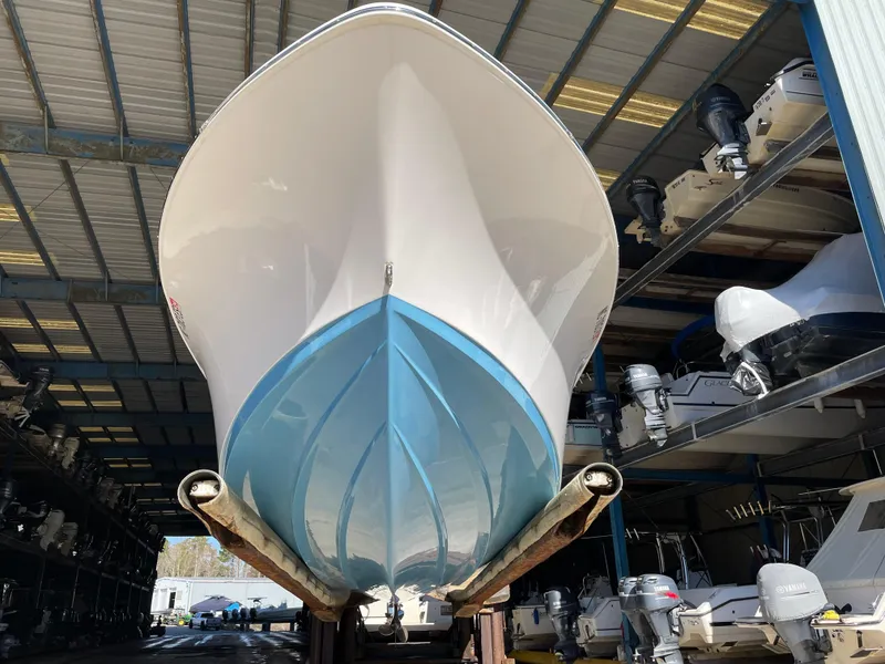 Slide: The Image of 2021 Sportsman Heritage 231 Center Console boat in storage facility. - 23