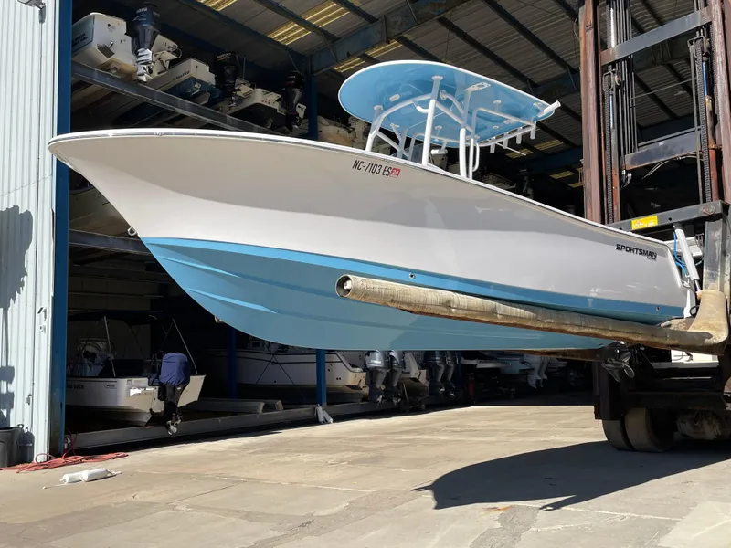 Slide: The Image of 2021 Sportsman Heritage 231 Center Console boat in storage facility. - 24