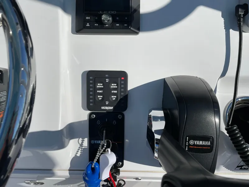 Slide: The Image of Control panel of 2021 Sportsman Heritage 231 Center Console with Yamaha throttle. - 33