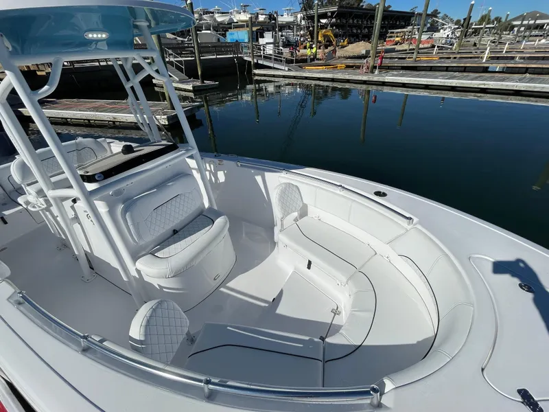 Slide: The Image of 2021 Sportsman Heritage 231 Center Console boat docked at marina. - 40