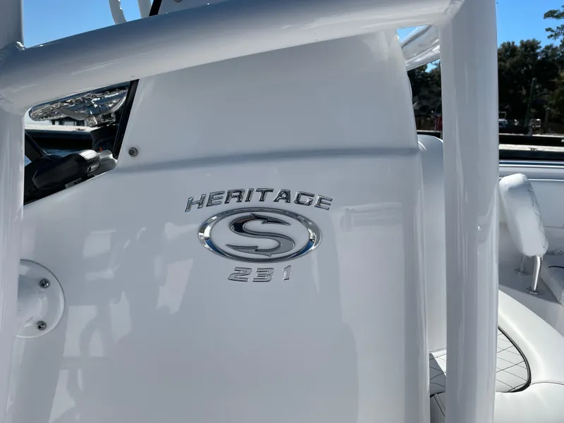 Slide: The Image of 2021 Sportsman Heritage 231 Center Console boat, close-up of logo and console details. - 43