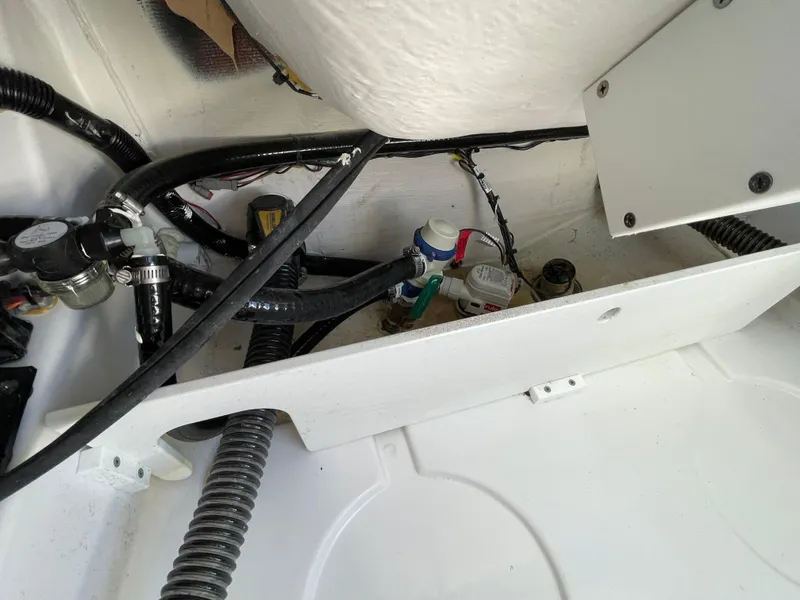 Slide: The Image of 2021 Sportsman Heritage 231 Center Console interior wiring and components. - 44