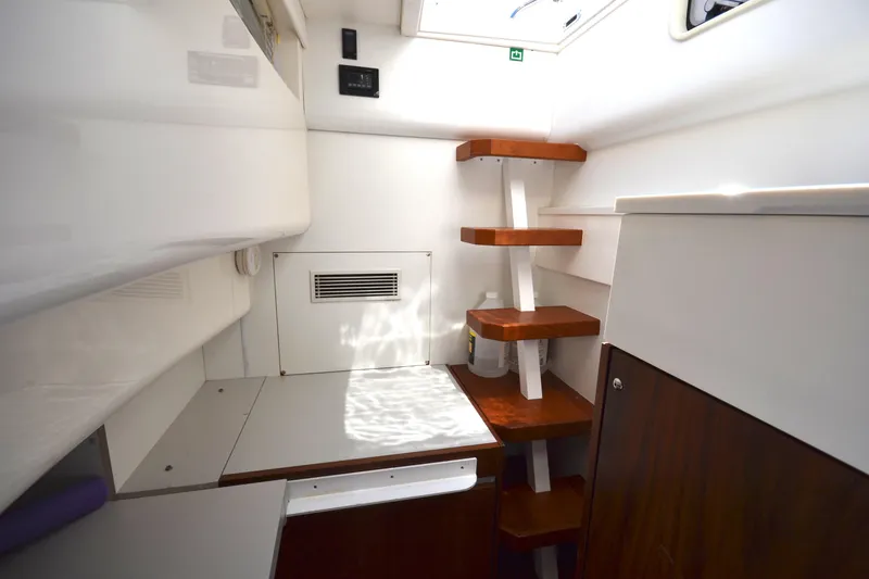Slide: The Image of Interior of 2013 Fairline Targa 50 GT yacht with wooden steps and white cabinetry. - 10