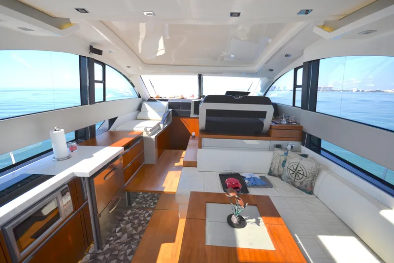 Slide: The Image of Luxurious interior of 2013 Fairline Targa 50 GT yacht with modern furnishings and ocean view. - 9