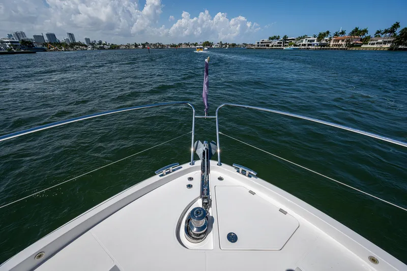 Slide: The Image of Bow view of 2019 Sunseeker Predator 50 yacht cruising on a sunny day. - 15