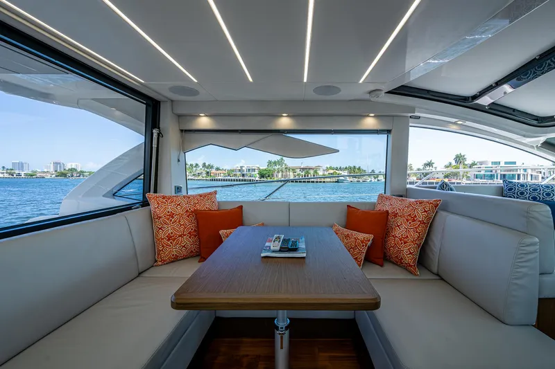 Slide: The Image of Luxurious interior of 2019 Sunseeker Predator 50 yacht with elegant seating and waterfront view. - 31