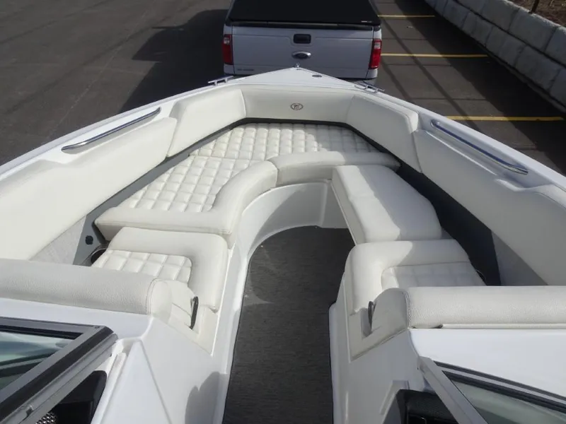 Slide: The Image of 2018 Cobalt R5 Surf boat with spacious white seating area. - 14