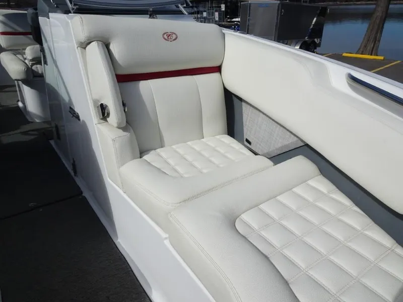 Slide: The Image of 2018 Cobalt R5 Surf boat interior with white cushioned seating. - 15