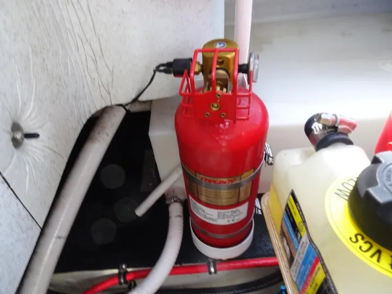 Slide: The Image of Fire extinguisher in 2018 Cobalt R5 Surf boat engine compartment. - 21