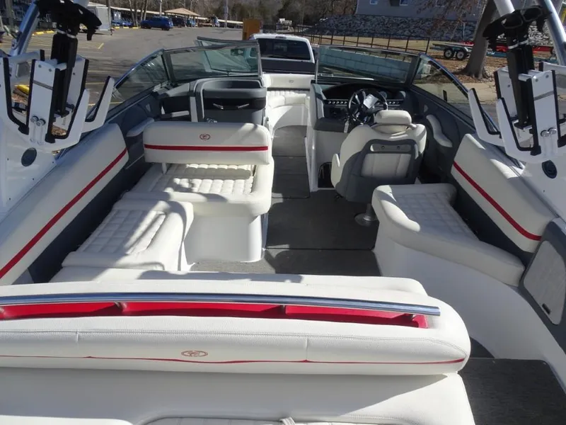 Slide: The Image of 2018 Cobalt R5 Surf boat interior with white seating and red accents. - 5