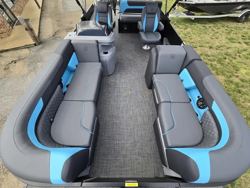 Slide: The Image of 2025 Godfrey Sweetwater 2286 SFLC boat interior with gray and blue seating. - 3