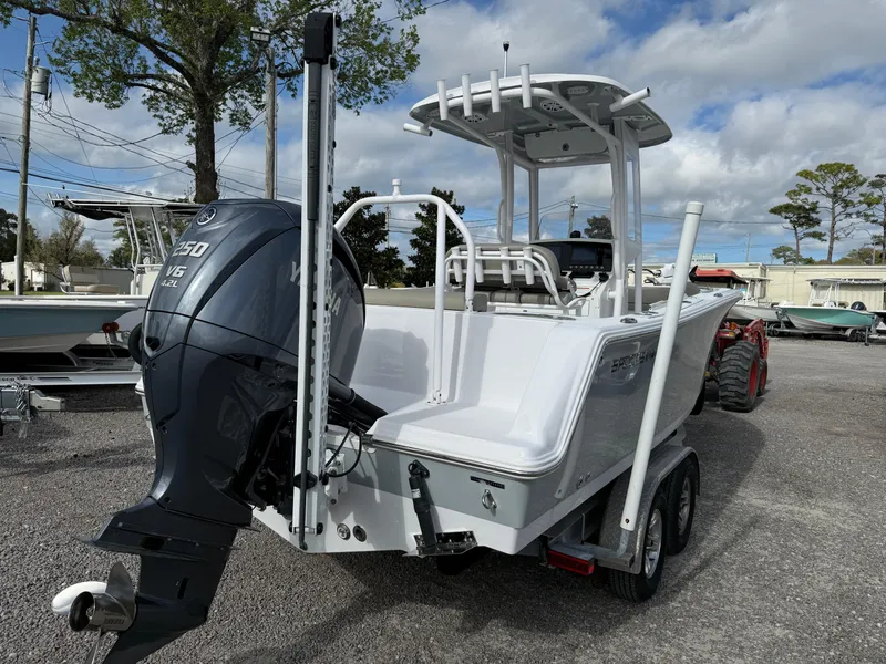 Slide: The Image of 2022 Sportsman Open 232 Center Console boat with Yamaha 250 engine on trailer. - 23