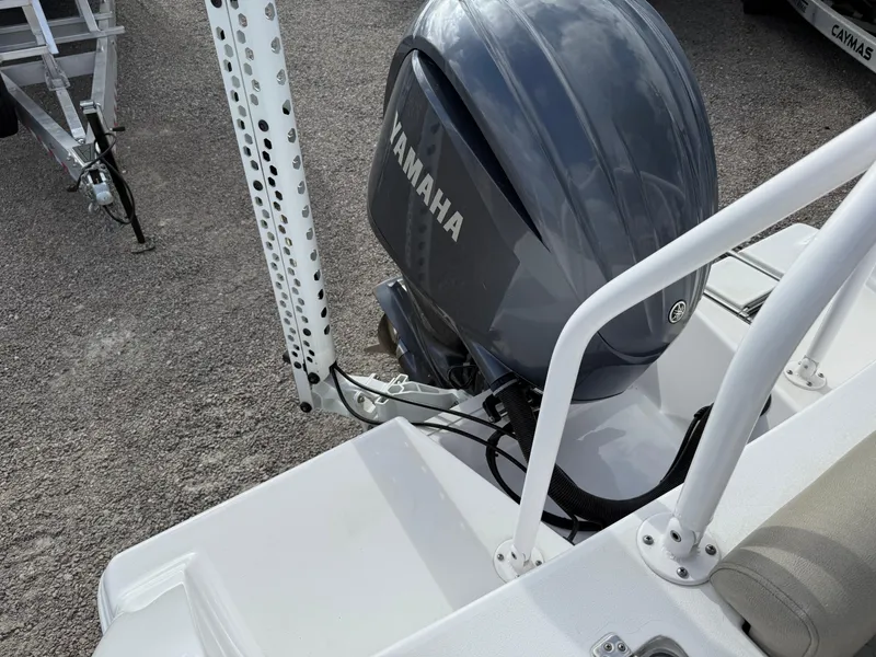 Slide: The Image of 2022 Sportsman Open 232 Center Console with Yamaha outboard motor, rear view. - 32
