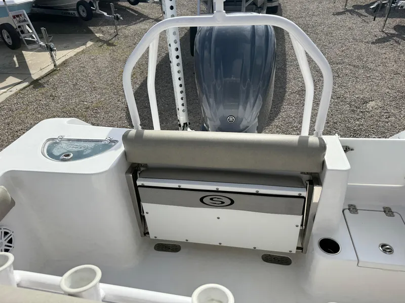 Slide: The Image of 2022 Sportsman Open 232 Center Console boat interior with seating and storage. - 37