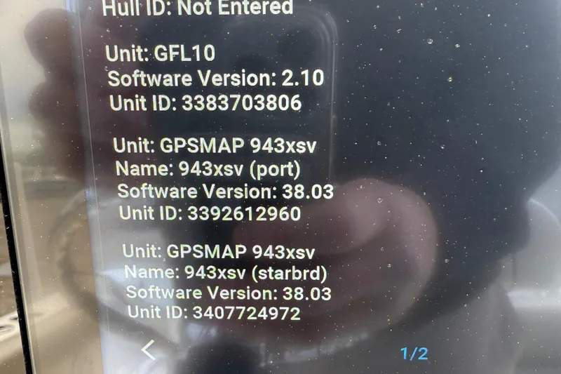 Slide: The Image of Display screen showing software versions and unit IDs for GPSMAP 943xsv on a 2022 Sportsman Open 232. - 39
