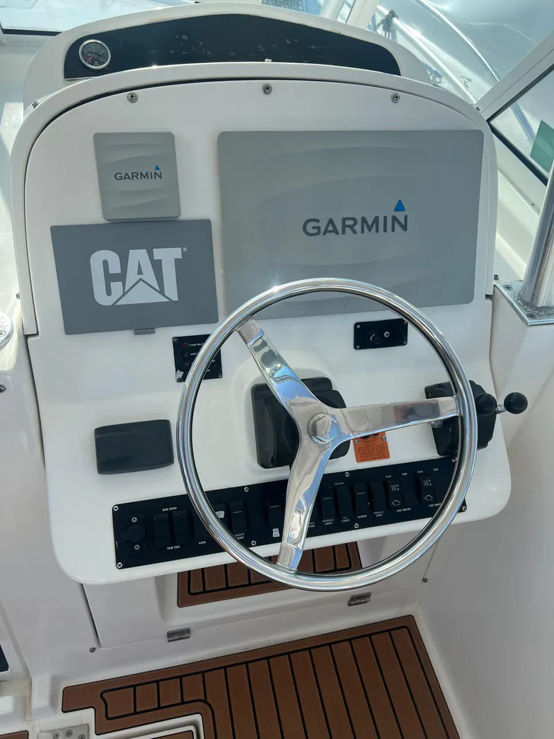 Slide: The Image of Luhrs 36 boat helm with Garmin and CAT controls, 2005 model. - 23