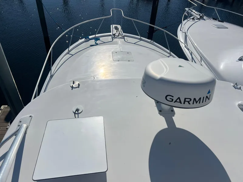 Slide: The Image of 2005 Luhrs 36 boat deck with Garmin radar, docked in marina. - 25