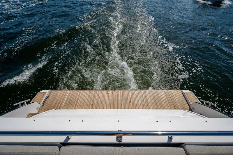 Slide: The Image of 2019 Azimut S7 yacht deck with ocean view and wake trail. - 10