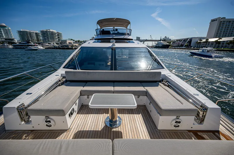 Slide: The Image of Luxurious 2019 Azimut S7 yacht with spacious deck seating and scenic waterfront view. - 15