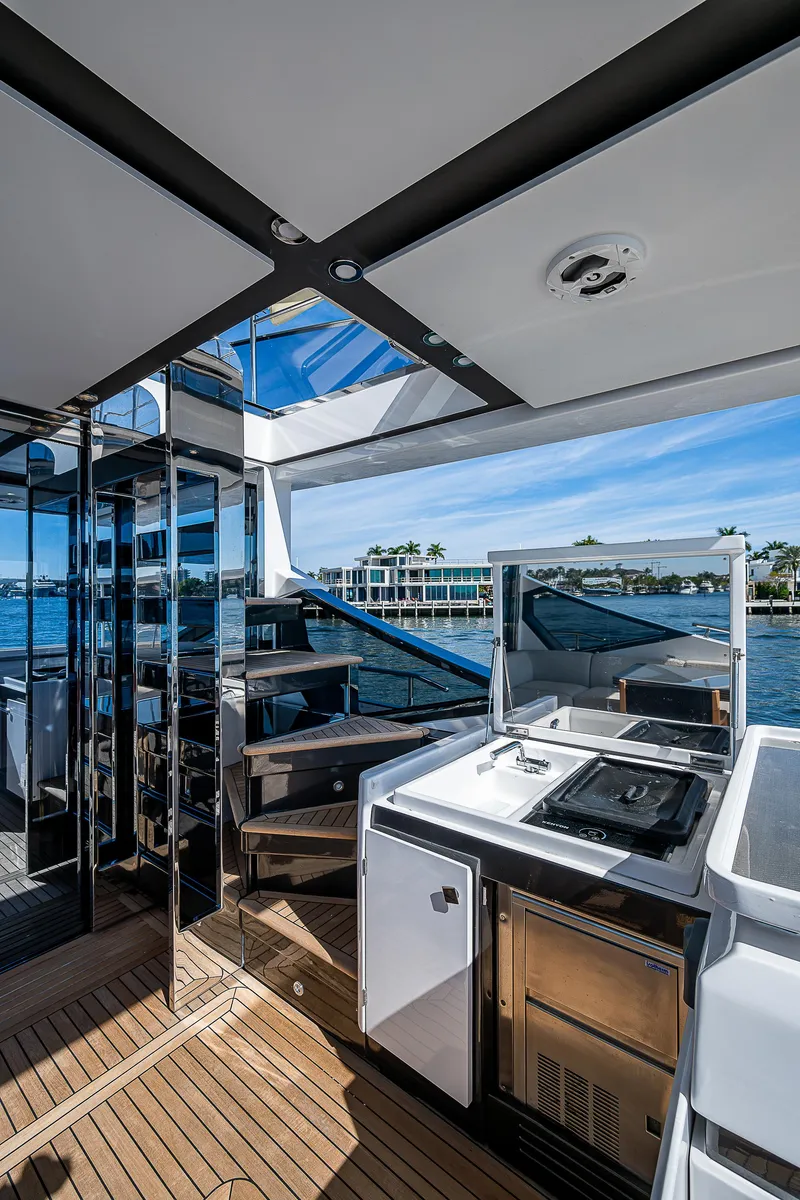 Slide: The Image of Luxurious 2019 Azimut S7 yacht interior with modern kitchen and scenic ocean view. - 27