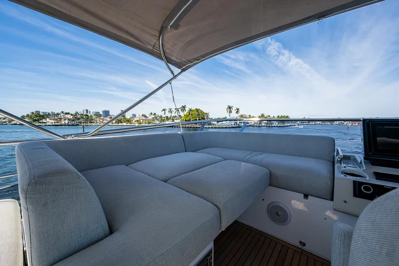 Slide: The Image of Luxurious 2019 Azimut S7 yacht with spacious seating, overlooking serene waterfront views. - 30