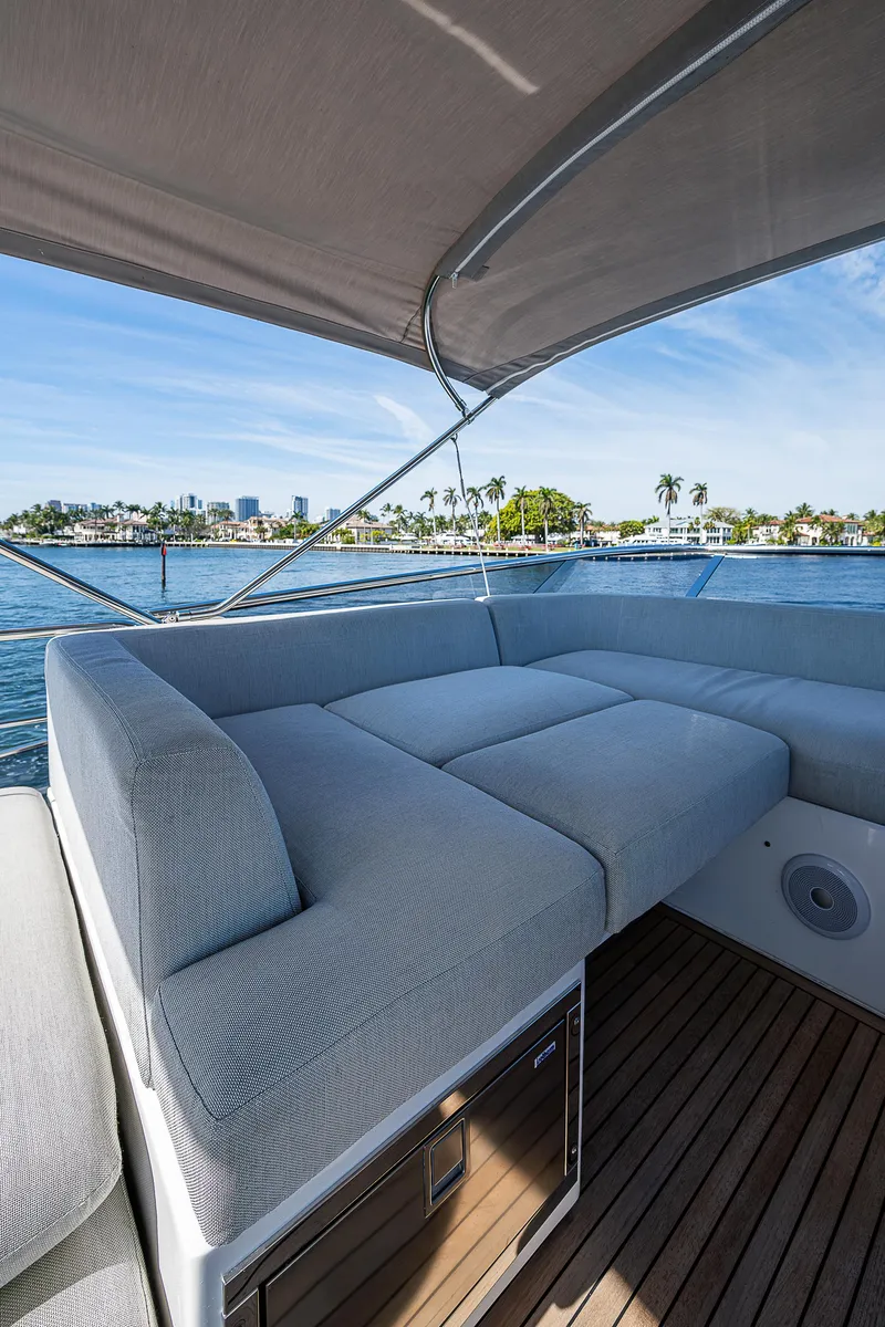 Slide: The Image of Luxurious 2019 Azimut S7 yacht with spacious outdoor seating and scenic waterfront view. - 31
