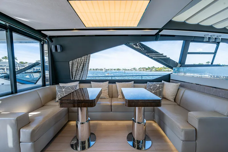 Slide: The Image of Luxurious interior of 2019 Azimut S7 yacht with elegant seating and tables. - 37