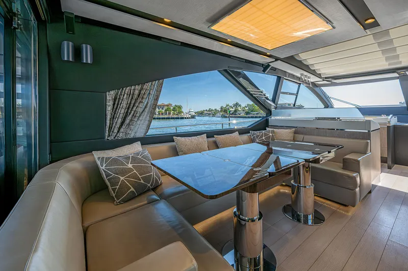 Slide: The Image of Luxurious interior of 2019 Azimut S7 yacht with elegant seating and panoramic windows. - 38