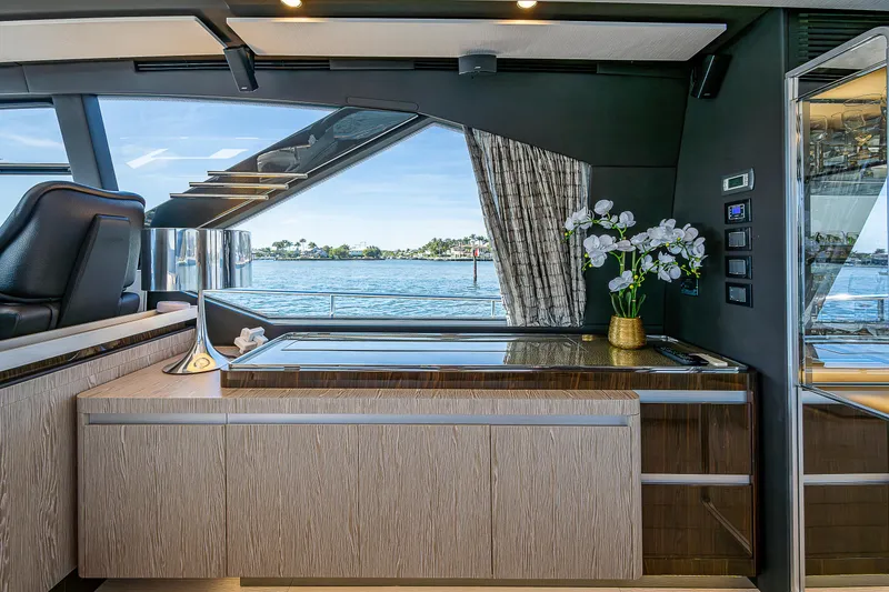 Slide: The Image of Luxurious interior of 2019 Azimut S7 yacht with elegant cabinetry and scenic ocean view. - 39