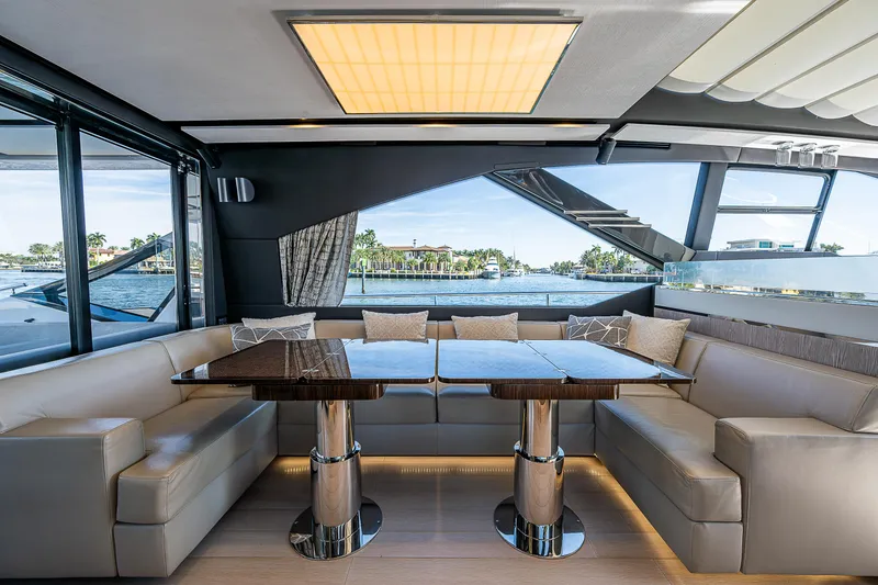 Slide: The Image of Luxurious interior of 2019 Azimut S7 yacht with elegant seating and dining area. - 40