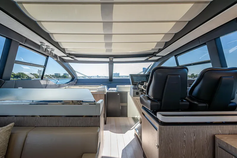 Slide: The Image of Interior of 2019 Azimut S7 yacht, featuring modern helm and luxurious seating. - 41