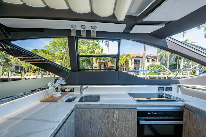 Slide: The Image of Luxurious interior of a 2019 Azimut S7 yacht with modern kitchen amenities. - 50