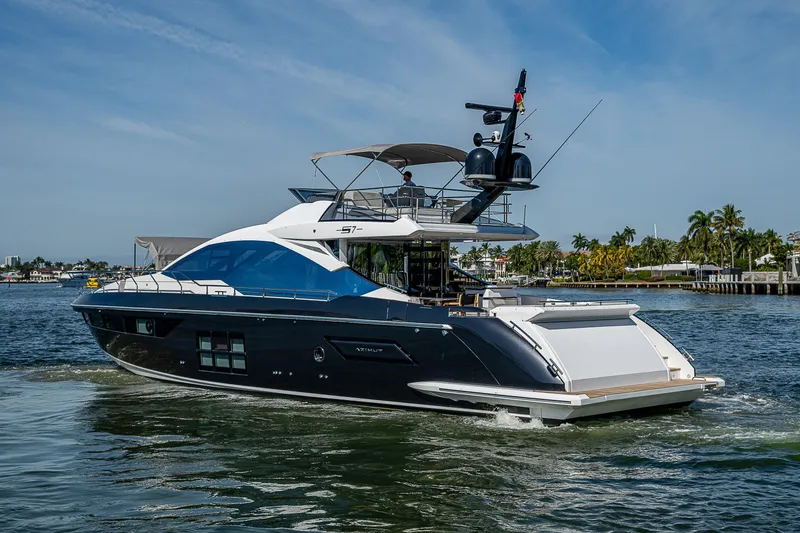 Slide: The Image of 2019 Azimut S7 yacht cruising on a sunny day, featuring sleek design and modern amenities. - 7